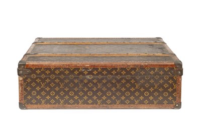 Lot 147 - A Louis Vuitton suitcase, with studded leather...