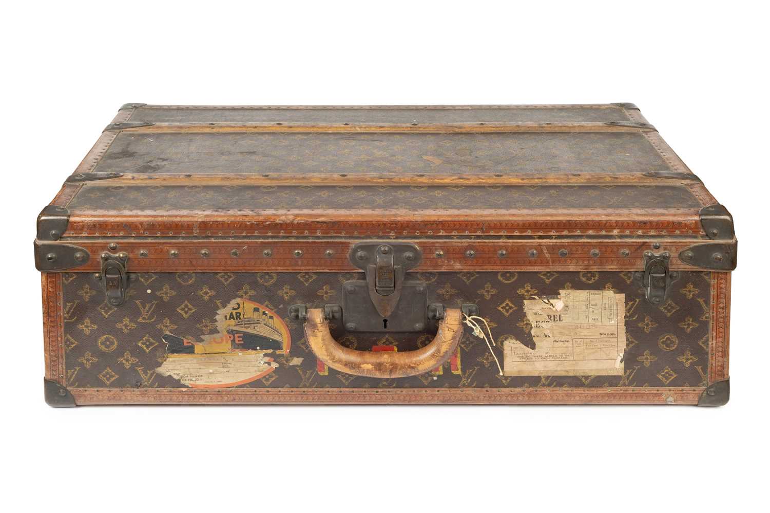 Lot 147 - A Louis Vuitton suitcase, with studded