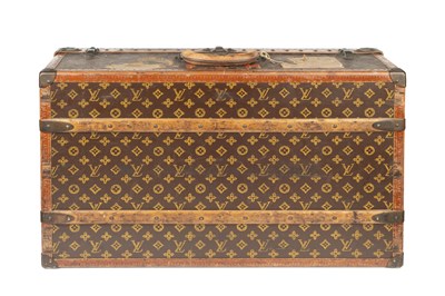 Lot 147 - A Louis Vuitton suitcase, with studded leather...