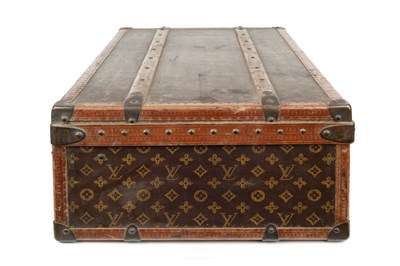 Lot 147 - A Louis Vuitton suitcase, with studded leather...