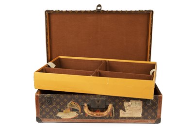 Lot 147 - A Louis Vuitton suitcase, with studded