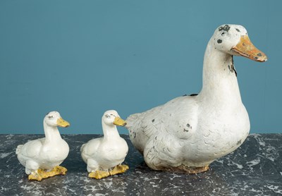 Lot 1185 - A group of three painted metal ducks