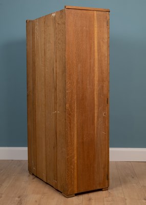 Lot 332 - An early to mid 20th century Ercol wardrobe