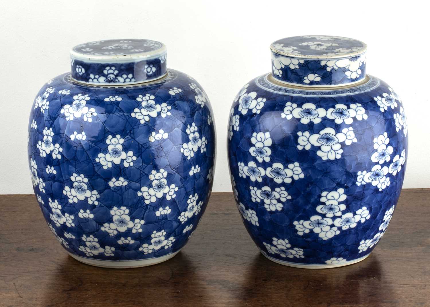 Lot 49 Two similar blue and white ginger jars and