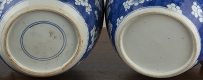 Lot 49 - Two similar blue and white ginger jars and...