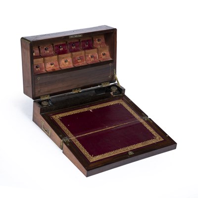 Lot 312 - A Regency rosewood brass inlaid writing slope...