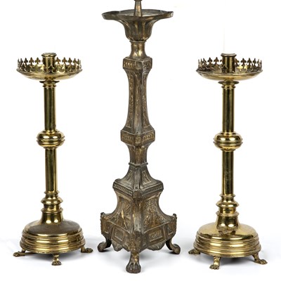 Lot 316 - A pair of ecclesiastical brass candlesticks...