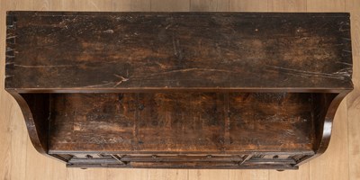 Lot 467 - An antique hardwood low chest