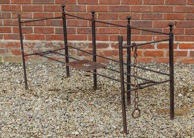 Lot 144 - A late 18th/early 19th century wrought iron fireside fender