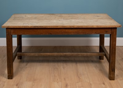 Lot 147 - An antique light oak kitchen table