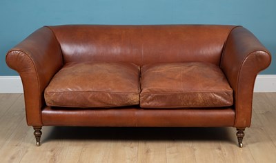 Lot 159 - A brown leather upholstered two seater settee