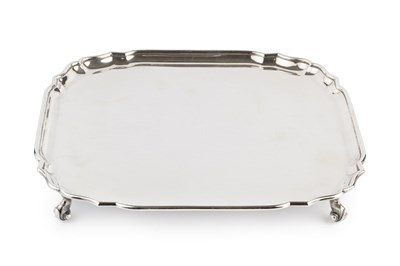 Lot 587 - A George V silver square section salver, with...