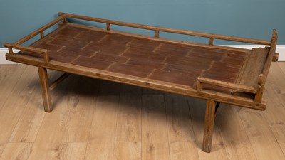 Lot 148 - A Chinese elm opium bed