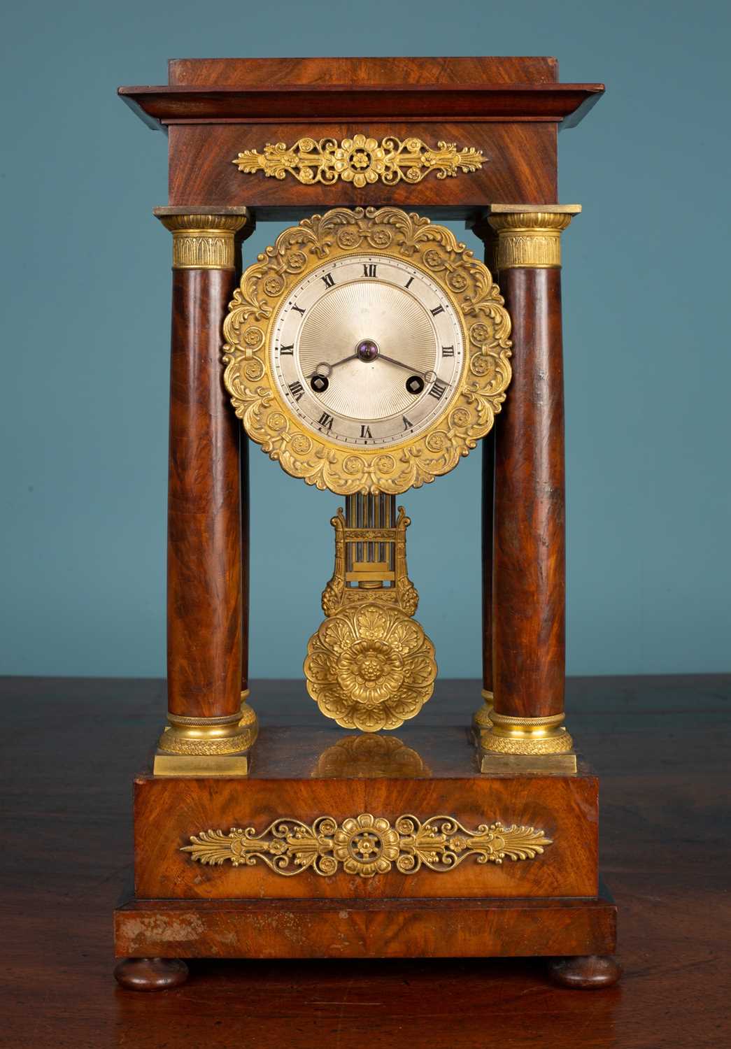 Lot 78 - A French portico mantle clock