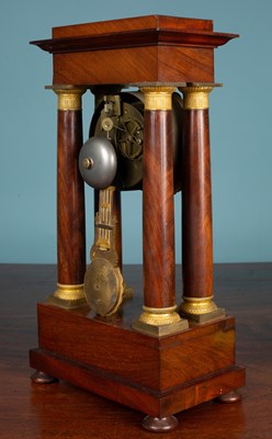 Lot 78 - A French portico mantle clock