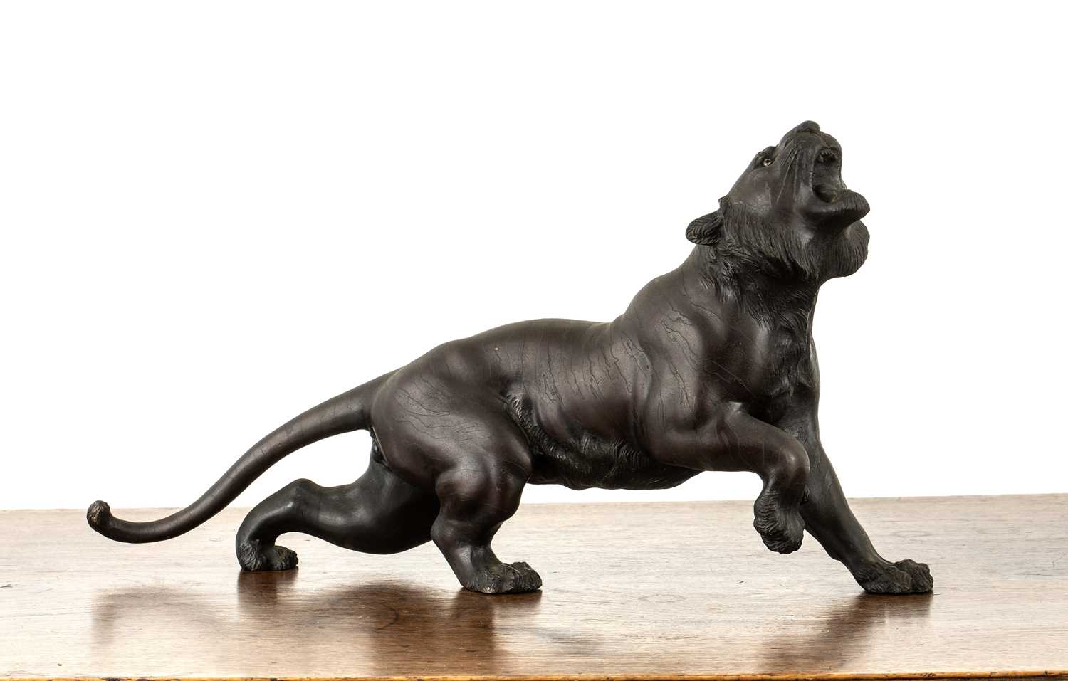 Lot 606 - Bronze model of a snarling tiger Japanese,...