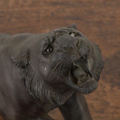 Lot 606 - Bronze model of a snarling tiger Japanese,...