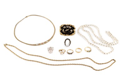 Lot 99 - A collection of jewellery, comprising a half...