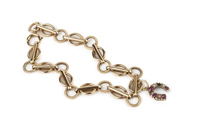 Lot 6 - A 9ct gold fancy-link bracelet, hallmarked for...