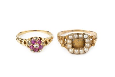 Lot 21 - A gem set cluster ring, designed as a...