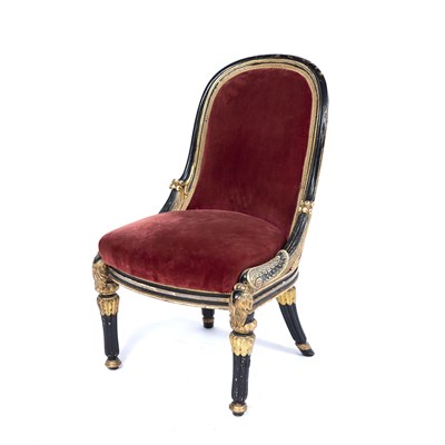 Lot 184 - A William IV ebonised and parcel gilt low...