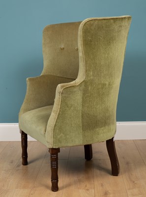 Lot 308 - An antique Georgian-style wingback armchair