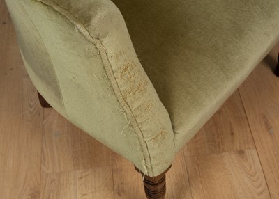 Lot 308 - An antique Georgian-style wingback armchair