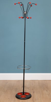 Lot 275 - A contemporary black painted iron floor standing coat and umbrella stand