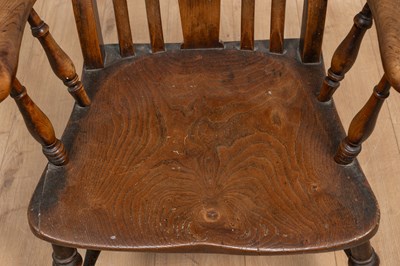 Lot 414 - An antique ash and elm Windsor armchair with splat pierced with initials 'IB'