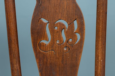 Lot 414 - An antique ash and elm Windsor armchair with splat pierced with initials 'IB'