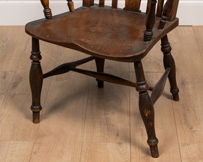 Lot 414 - An antique ash and elm Windsor armchair with splat pierced with initials 'IB'