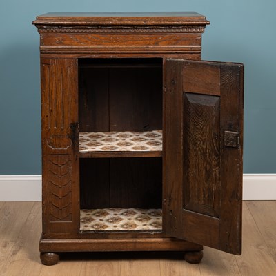 Lot 212 - An antique Continental oak cupboard