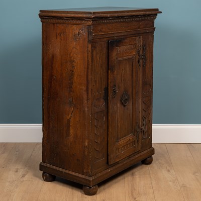 Lot 212 - An antique Continental oak cupboard