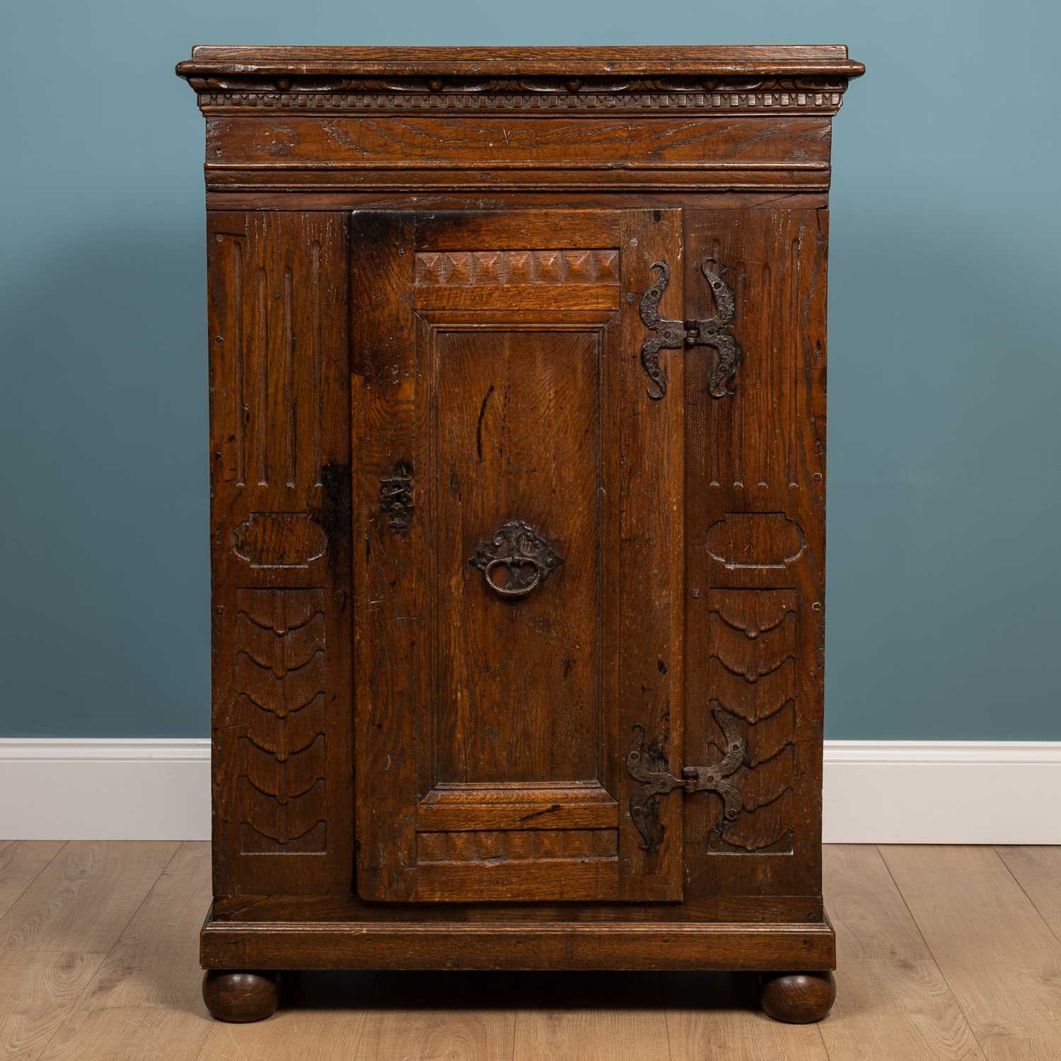 Lot 212 - An antique Continental oak cupboard