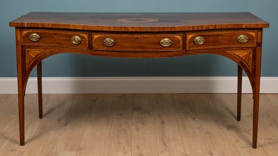 Lot 548 - A 19th century mahogany serpentine fronted serving table