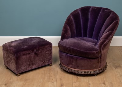 Lot 358 - A mid-20th century purple upholstered tub chair and a similarly upholstered small ottoman stool