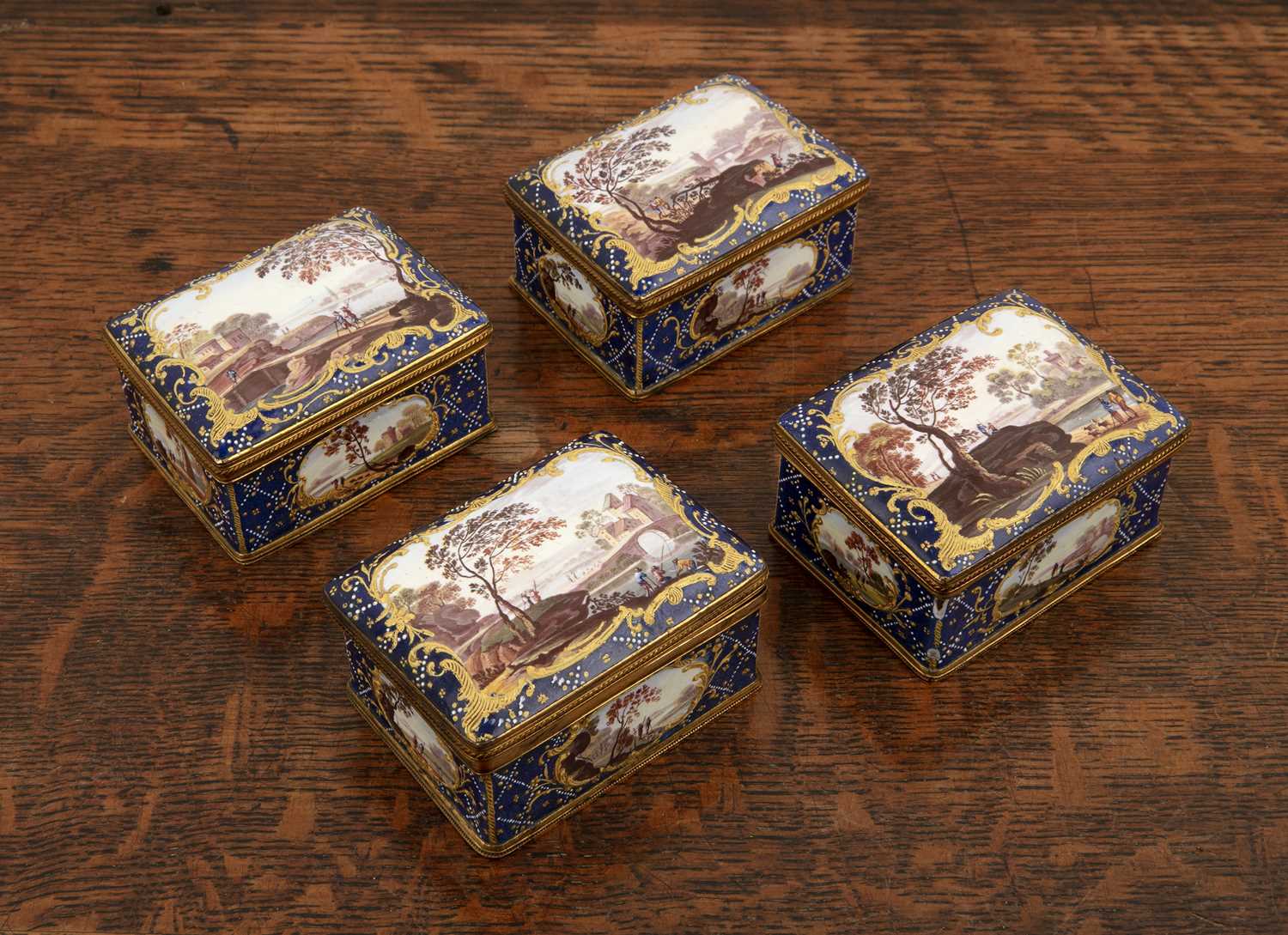 Lot 325 - Set of four rectangular shaped enamel boxes...