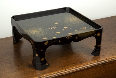 Lot 499 - Black and gold hiramaki-e lacquer stand...