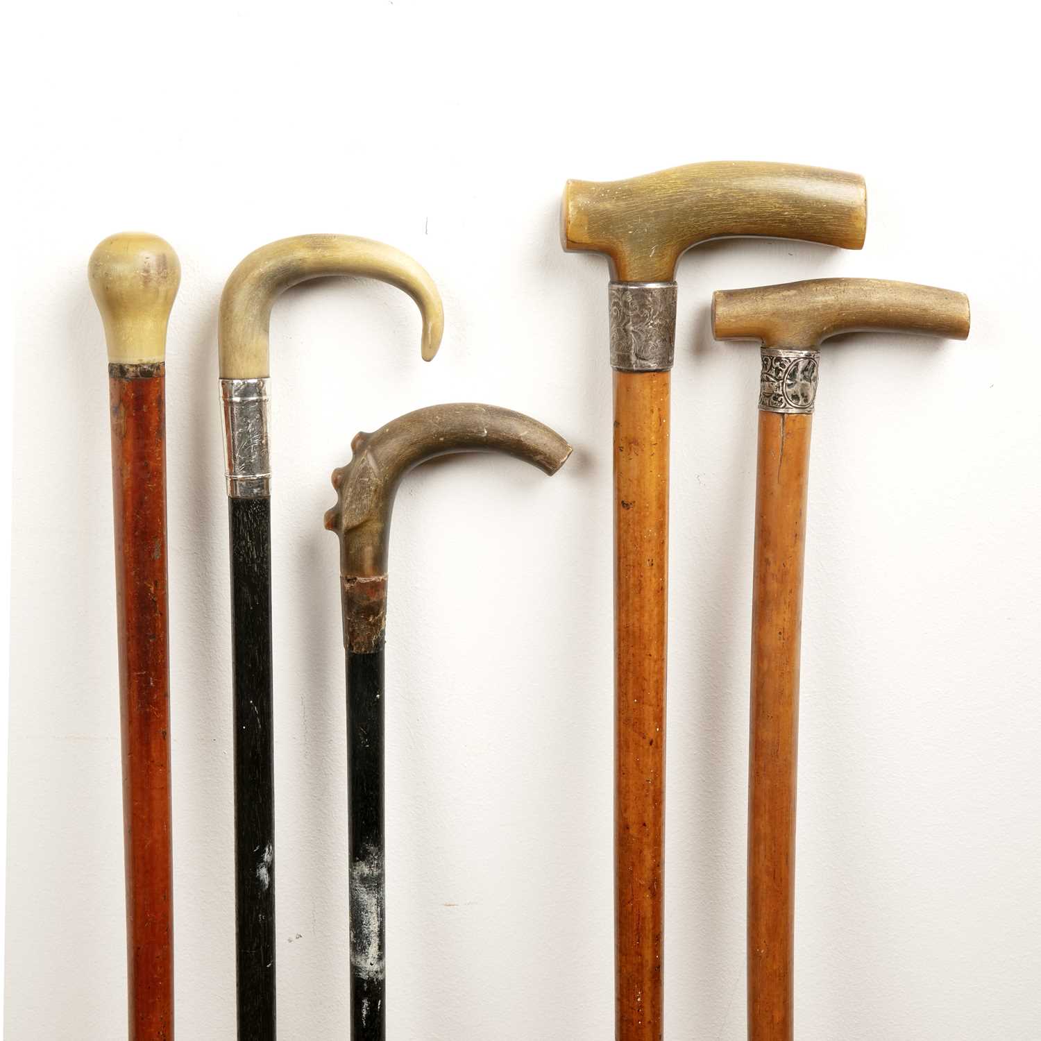 Lot 326 - Four horn (probably rhino horn) walking sticks...