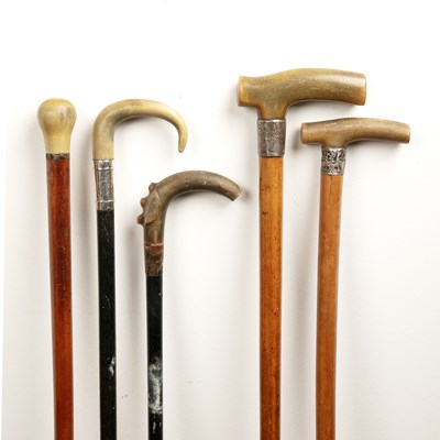 Lot 326 - Four horn (probably rhino horn) walking sticks...