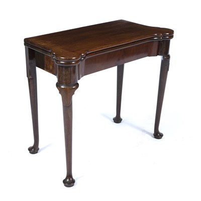 Lot 193 - A George III mahogany fold over card table...