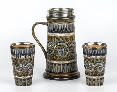 Lot 327 - A Doulton Lambeth lemonade jug and beakers by...