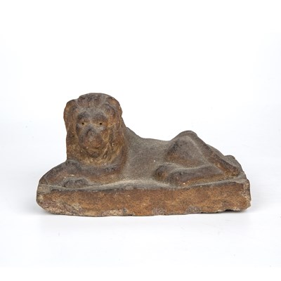 Lot 331 - An early 19th century stoneware recumbent lion...