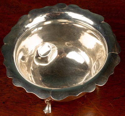 Lot 43 - A quantity of silver comprising of three silver jugs; a sugar basin; two salts; and a mustard pot