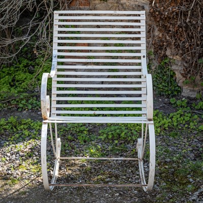 Lot 238 - A Victorian-style wrought iron garden rocking chair