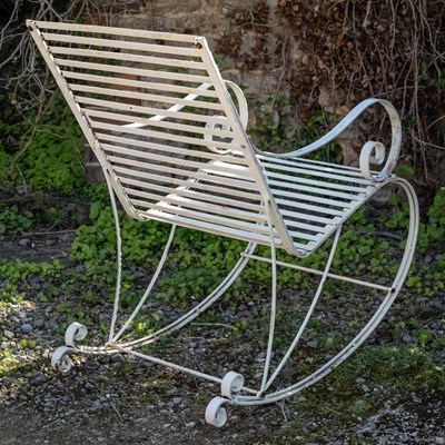 Lot 238 - A Victorian-style wrought iron garden rocking chair