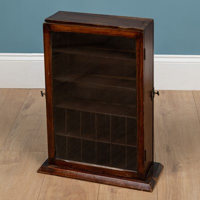 Lot 124 - A 19th century mahogany apothecary cabinet
