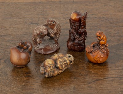 Lot 473 - Group of wood netsukes and ojime Japanese to...