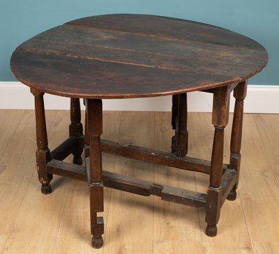 Lot 232 - A 19th century oak gateleg table