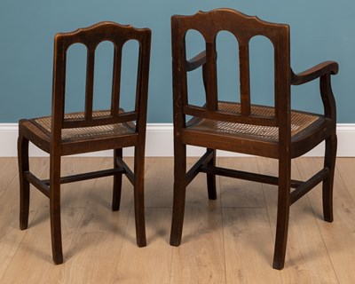 Lot 235 - A set of eight Gothic style dining chairs